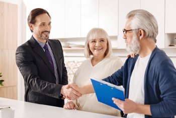 A man shaking hand with the client