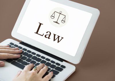 Women working on a laptop providing Deposition Services by Talty Court Reporters in San Jose
